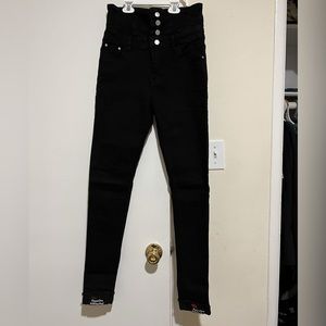 Black jeans, new jeans, no stain no tears.